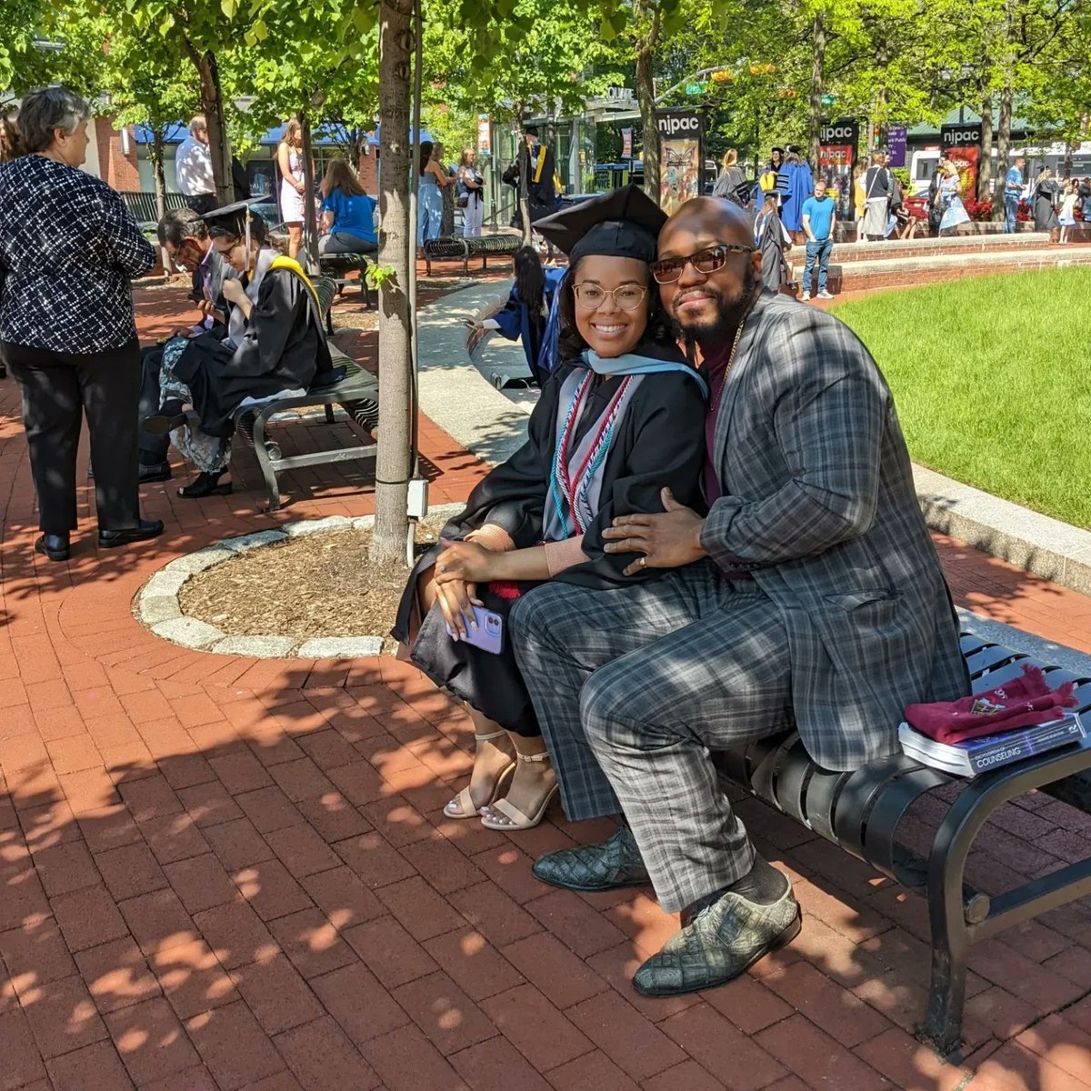 margmccorry's tweet photo. Smiling faces, happy day. Congratulations, Kean graduates! #Kean2022 #CougarsClimbHigher https://t.co/pCvtpEKy49