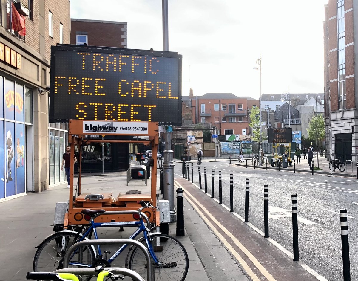 Two electronic signs on Parnell Street, reading "Traffic free Capel Street, from May 20th".