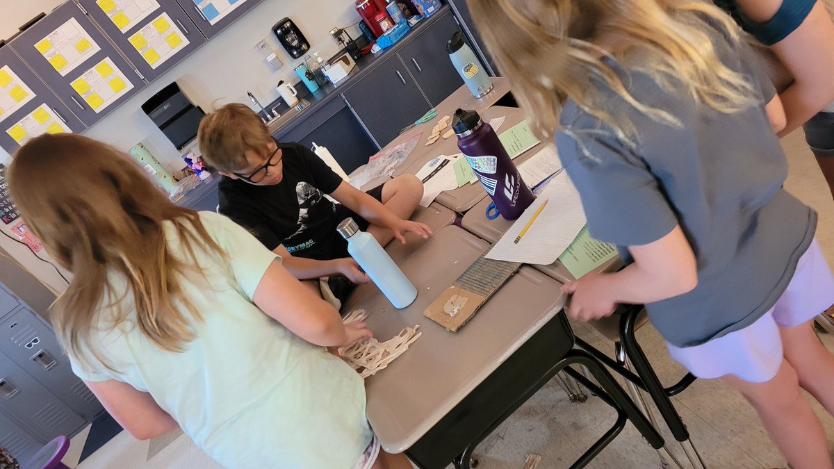 MrsThomasTeach5's tweet photo. This week's #PBL bridge challenge is to take their bridge and adjust their design to make it stronger. Many groups have gone back to the drawing board to redesign their bridge! 💜💛💜 https://t.co/HMWTgUTa6r