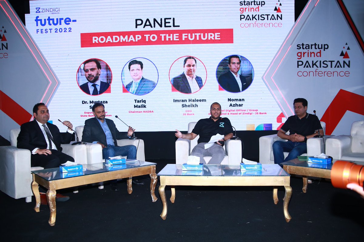 FutureFestPK's tweet photo. Panel Discussion on Roadmap to the Future featured Deputy Governor @StateBank_Pak @murtazahsyed Chairman @NadraPak @ReplyTariq, COO @JSBLPak & Chief Digital Officer @JSBLPak in @StartupGrind Conference at the #ZindigiFutureFest #FromPakistanWithTech https://t.co/I7kAyditzl
