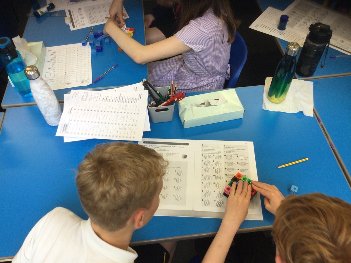 StMarys_Hinck's tweet photo. Cousteau maths are finding the volume of 3D shapes and then finding the volume needed to make the shape into a cuboid? We used cubes to support our learning visually as well as using a formula. #volume #workingtogether #mathsinvestigation https://t.co/C7g5T7NU7I