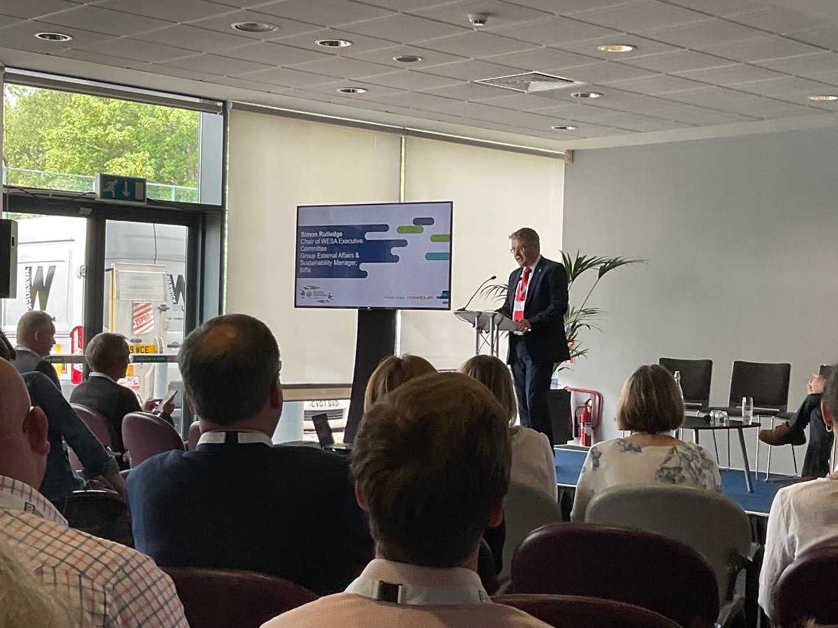 CIWM's tweet photo. @Biffa ’s Rutledge, Chair of the WESA Executive Committee, steps up to the #ciwmresource22 podium to give us the industry viewpoint for how the Welsh resources sector can decarbonise. https://t.co/tbUfiPWNCB