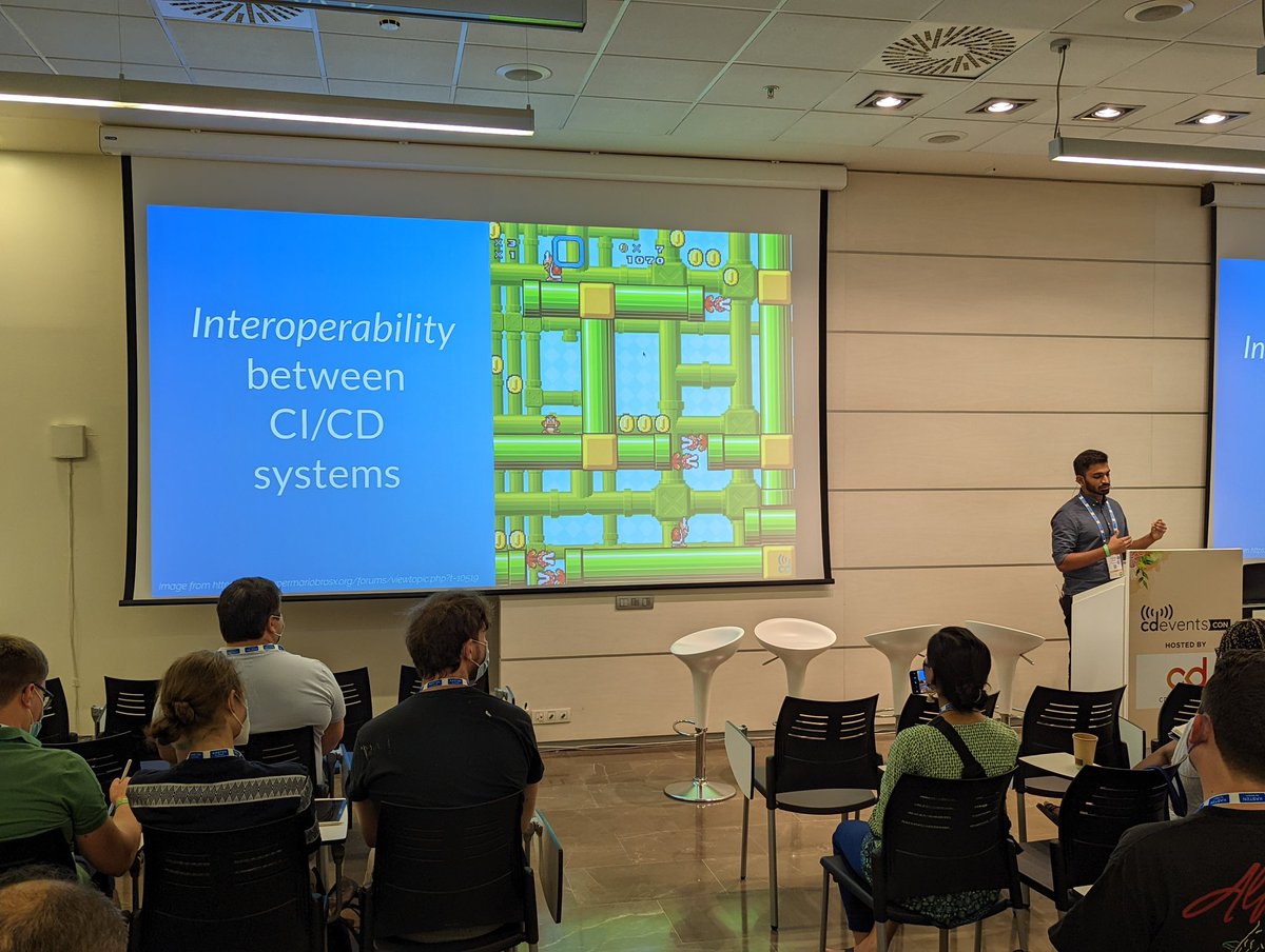 _cdevents's tweet photo. Interoperability between CI/CD systems with @BobadeVibhav at #CDEventsCon https://t.co/adBzGN3vpg