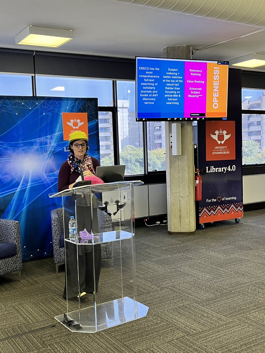 UJLibrary's tweet photo. Creative way #Sponsor presentation by #EBSCO Bronwyn Rossmann - change of hats and products #Discovery #FOLIO #PANORAMA #UJLibraryIntConf2022 https://t.co/5Q53elJTxn