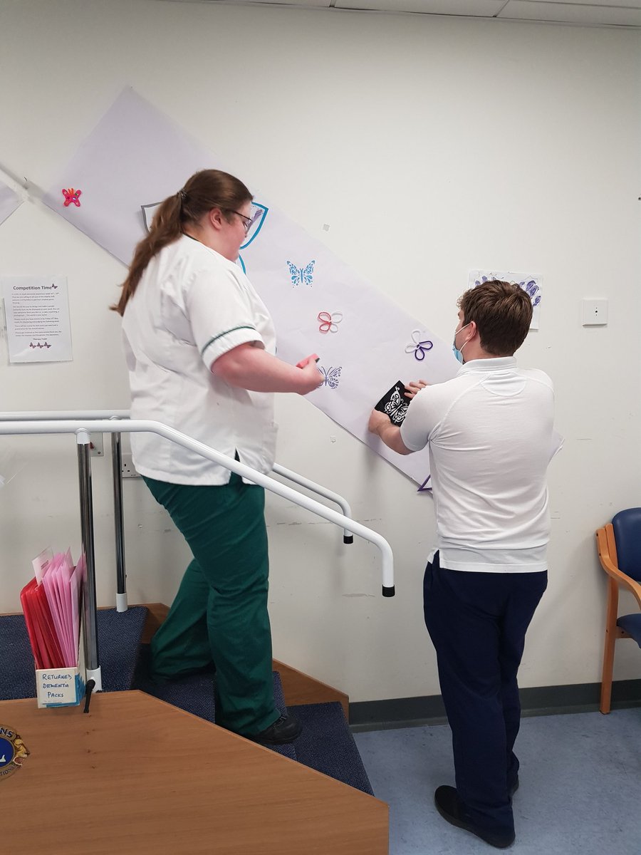 AlexJS_PT's tweet photo. On our Care of the Elderly unit, we got ready for Dementia awareness week &amp; created a butterfly wall! 
Patients got involved and made painted hand prints to fill the butterfly wings🦋
A fun afternoon with lots of giggles (and lots of glitter!), and here was the result😁 https://t.co/n5AJvCn8W6