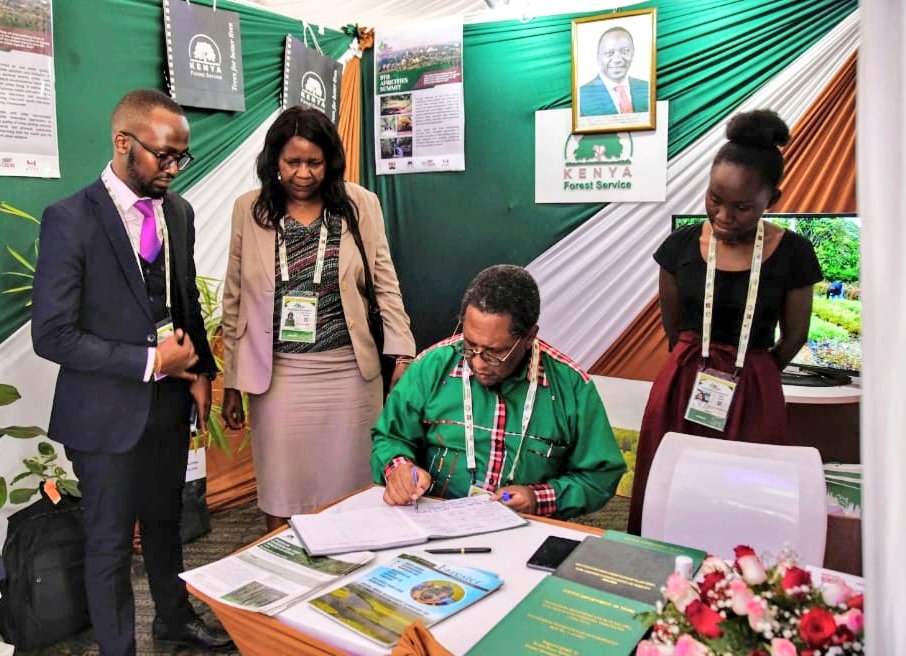 Environment_Ke's tweet photo. Pictorial : @Environment_Ke CS Keriako Tobiko today signed a visitors book at the @KeForestService @KICDKenya @lvswwda exhibition stands at the Ninth Africities Summit in Kisumu County #Africities2022 https://t.co/UkcucIkSHG