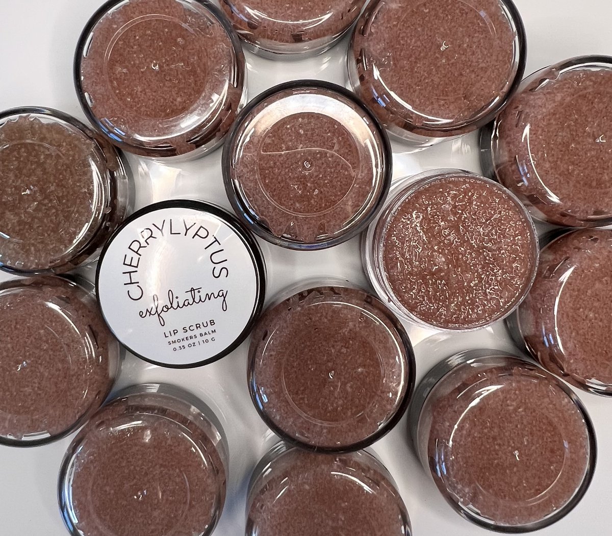 Smokersbalm1's tweet photo. It sounds like “Cherrylyptus Flavored Scrub” time! Our most popular lip scrub is back in stock. We are so sorry for the wait. Now, you can enjoy our 10 gram size all day every day. https://t.co/RmNbkhZ7nD