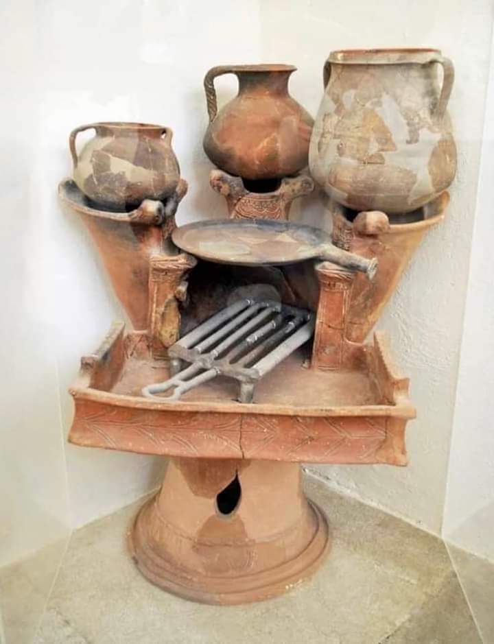 A 2500 year old ancient Greek 'cooker': three (or four) stoves, oven and a grill. Found on the Greek island of Delos. This ancient greek clay anthrakia aka coal-fuel stove, used for cooking and heating.

Archaeological museum of Delos, Greece