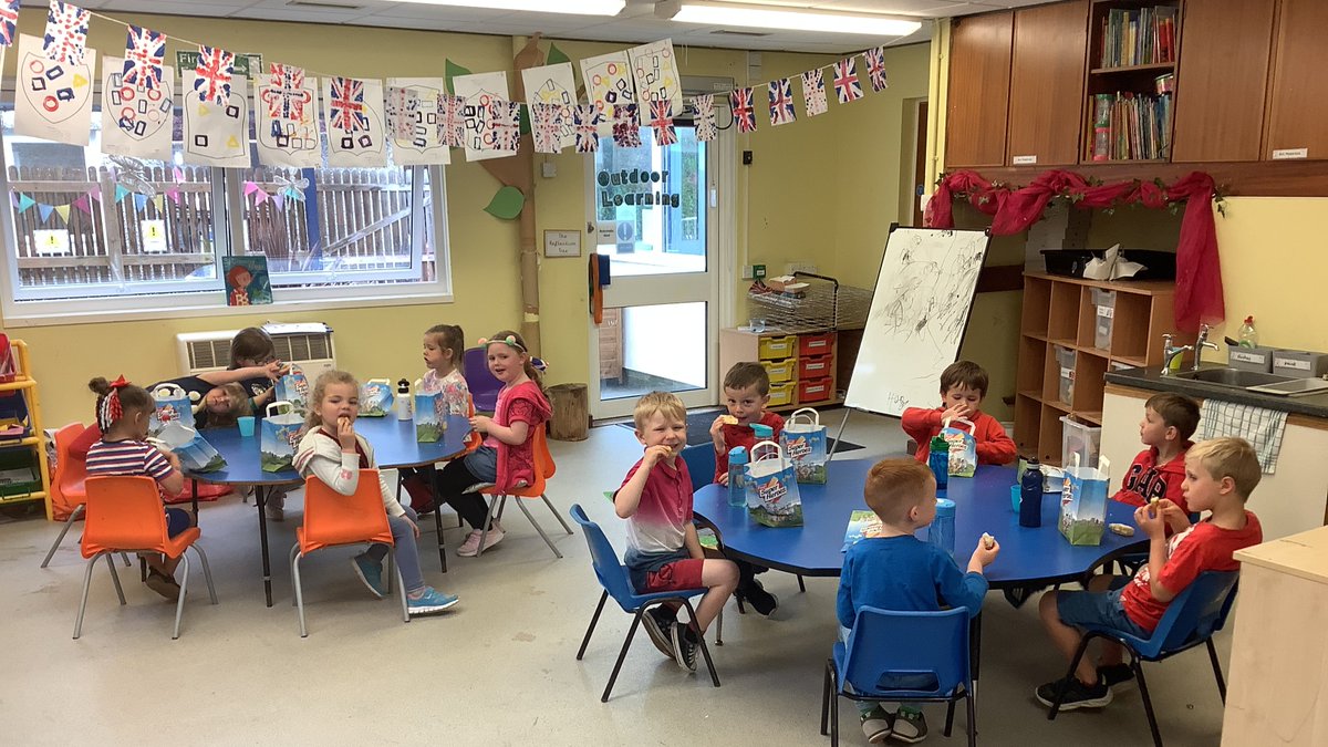 ADMAT_SSCA's tweet photo. To start our #PlatinumJubileeCelebration  this week the children came dressed in red, white and blue and we had a whole school finger buffet fit for a Queen! The rain didn't dampen our enjoyment but did change the location! Picnic in the grounds when the sun returns! https://t.co/0PcaX8PSVj