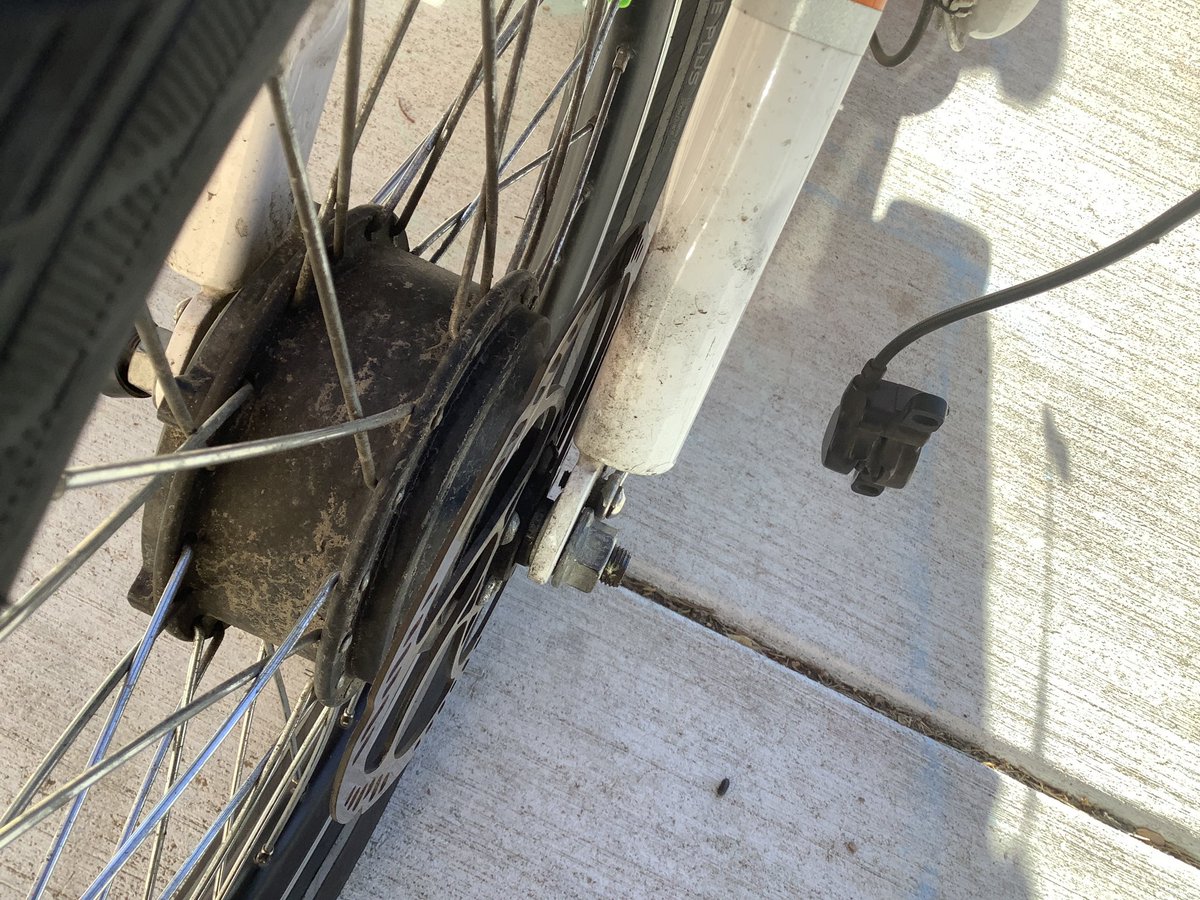 ddchen's tweet photo. It finally happened. 😖 A peloton of #roadies going too fast into a curve crashed into us. There was a 🚶🏻♀️ , leader slammed his brakes. One went down and into us. Now I have a bent rotor and misaligned wheel. He’s OK, but embarrassed. #BikeDen #pathlete https://t.co/nWeEiCHa81