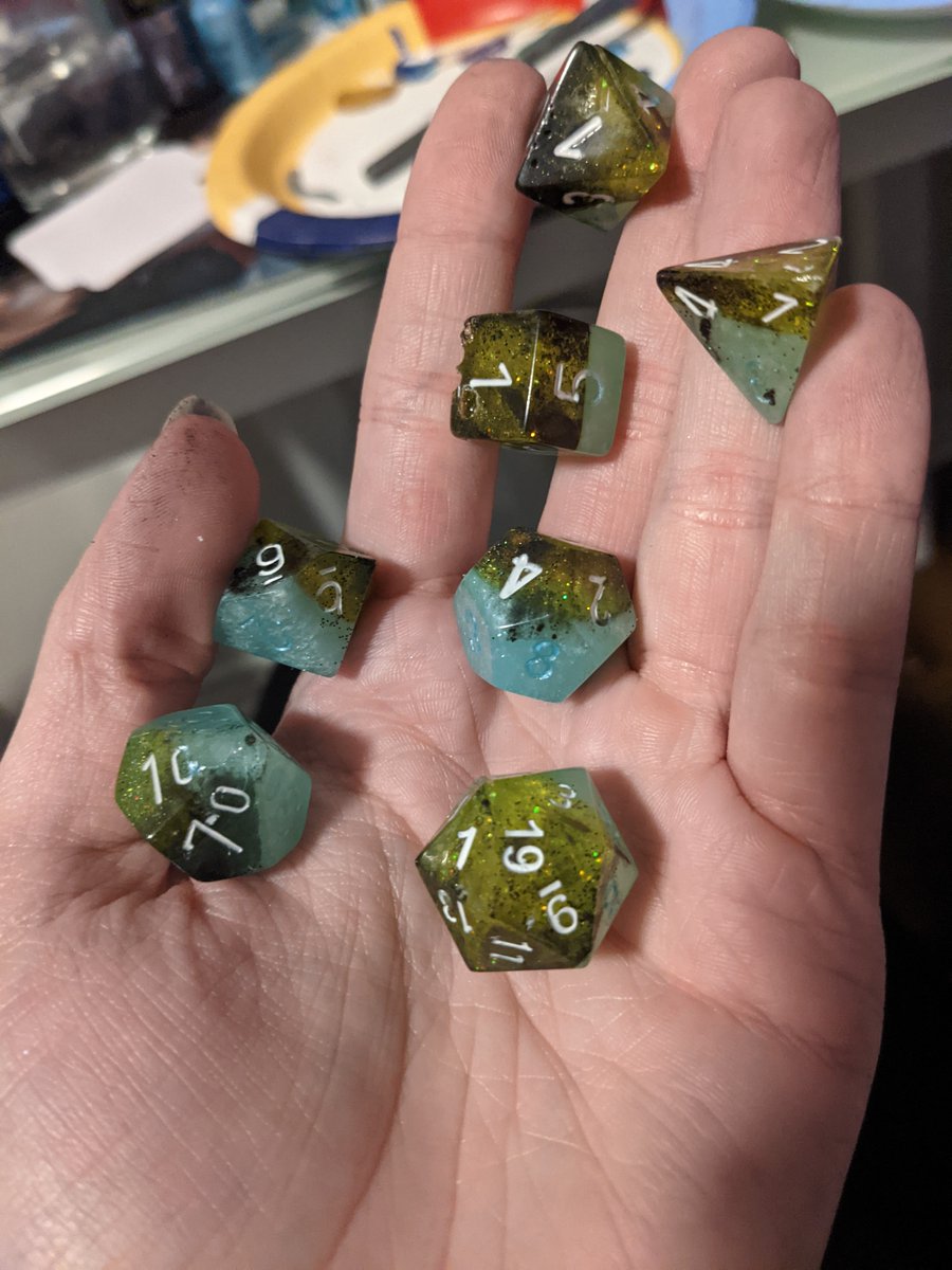 DawnlightDice's tweet photo. Todays set is one of my most "fun" 
"Gift of Mercy"
Made for the lovely @ ACrumbyVA For her D&amp;D character Fenris and a crush they had in their campaign with the best boi on fire 

#Dnd #TTRPG #Dice  #handmadedice https://t.co/pG6Jxo4vAB