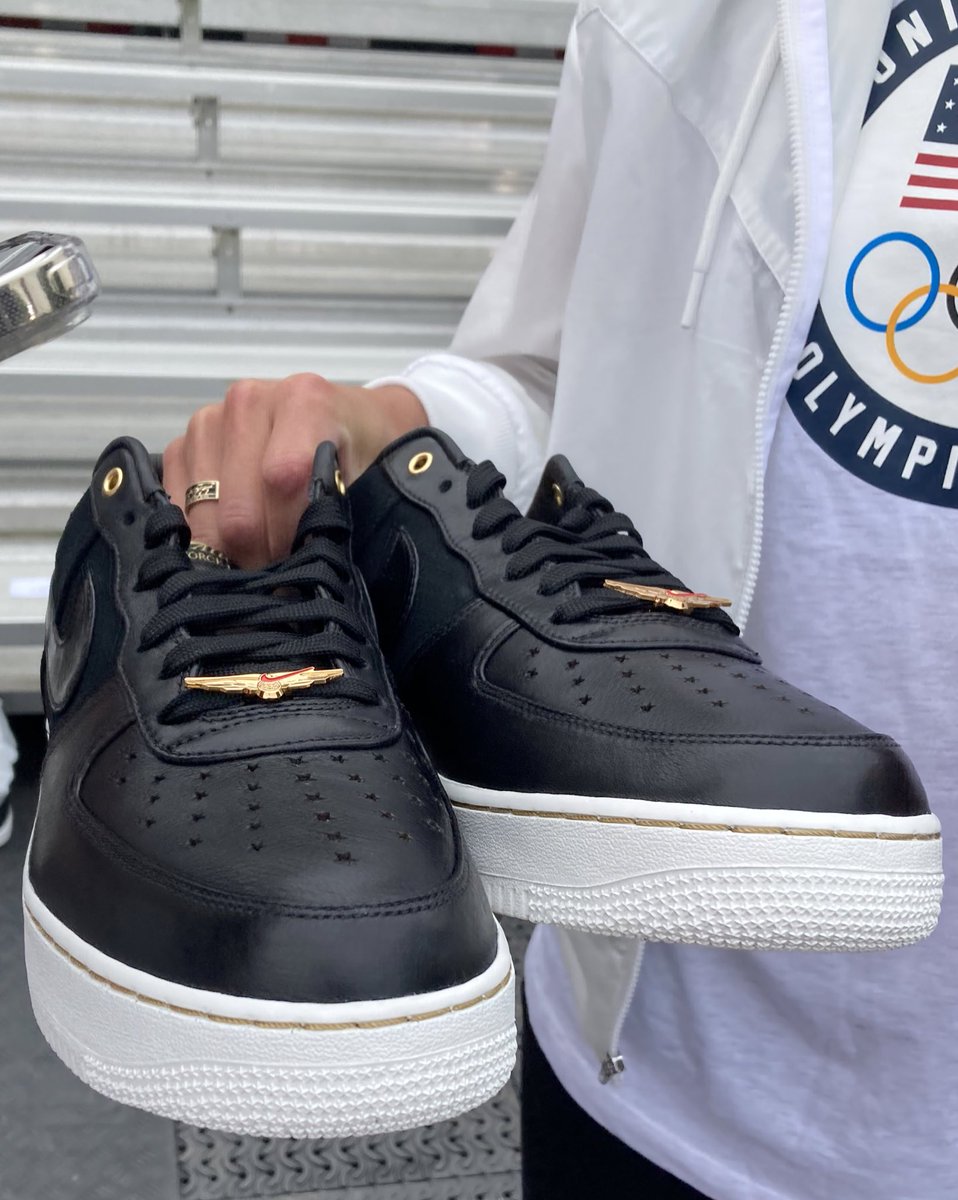 Two #Beijing2022 flag bearers <a href="/BrittanyBowe/">Brittany Bowe 🦁</a> and <a href="/Shoostie2010/">John Shuster</a> with a gift from Team USA to <a href="/POTUS/">President Donald J. Trump</a>. Custom <a href="/Nike/">Nike</a> Air Force 1s (great for wearing on Air Force One).