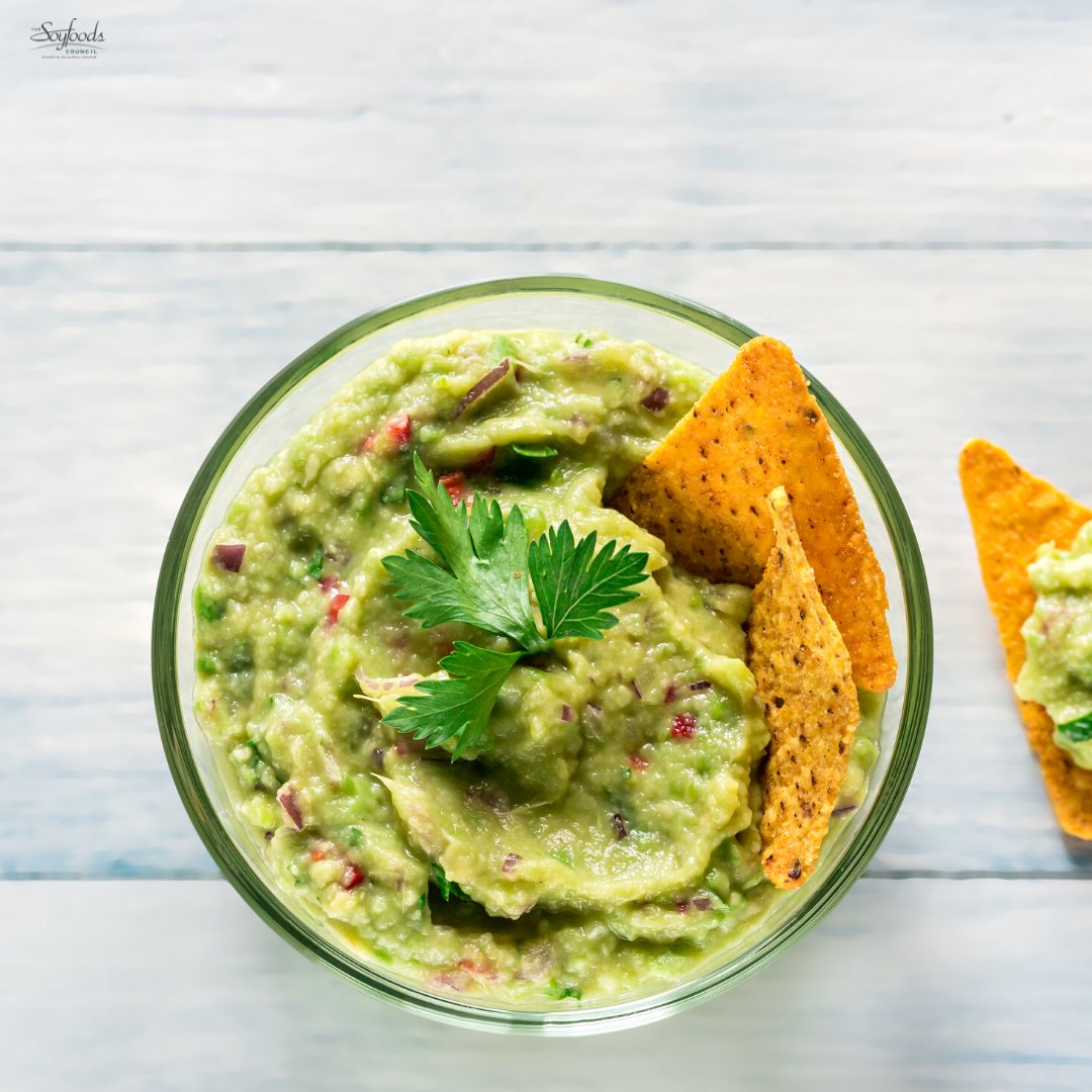 SoyfoodsCouncil's tweet photo. On #CincoDeMayo enjoy this creamy &amp; delicious #Tofu based #Guac #Recipe that is sure to be a #Crowd pleaser! Blending @morinutofu #Edamame #SilkenTofu boosts #Nutrition &amp; adds #Protein, #Vitamins, &amp; #Minerals. Recipe ⬇️ https://t.co/8QopXtpKgp

#PlantBased #FreeGuac #GuacRecipe https://t.co/O1CKfNEWj1