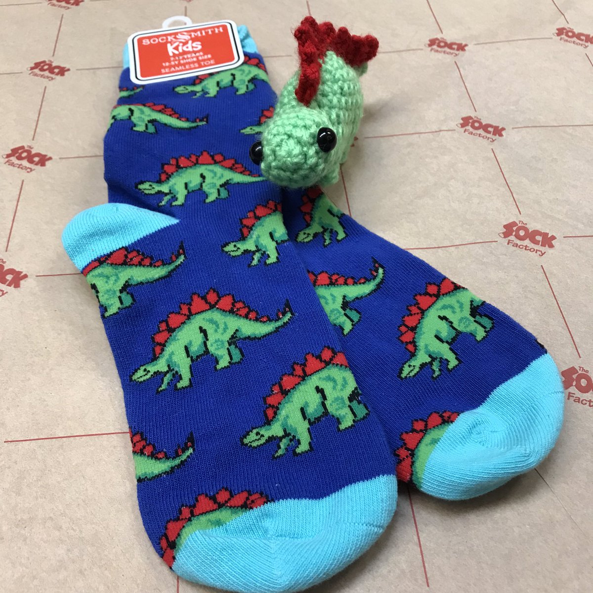 SocksWaterloo's tweet photo. Steggy is positioned perfectly his first photo shoot!! Say cheeeeese!! 😂💚💙❤️🧦🦕🦖@Socksmith #leggomysteggo #kidssocks https://t.co/EmFR5fFthe https://t.co/n6HzPMpurW