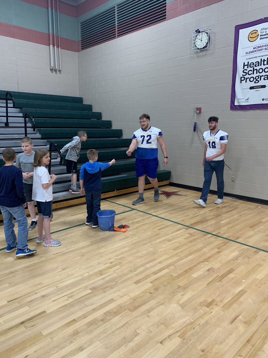 🚨🚨Eagles football players are back in the community trying to make a difference. Thank you Abby White, principal at McBrayer Elementary School, for having our players and @RobTenyerMSU to speak and have some fun at the carnival #SoarHigher