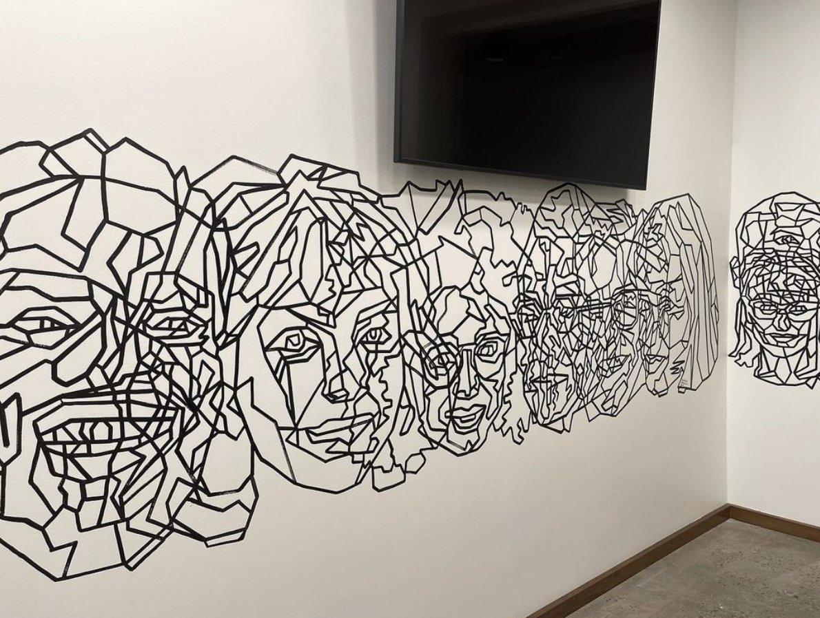 Genesco_Inc's tweet photo. A peek inside our new 535 offices! Capturing Genesco's spirit through works of art of our iconic brands &amp; building the excitement for our future. Thank you to Attagirl Brands &amp; Nashville artists for creating incredible art for 535! 💙 #footwearfocused #genesco #genescocares https://t.co/UvOiOwdrcA