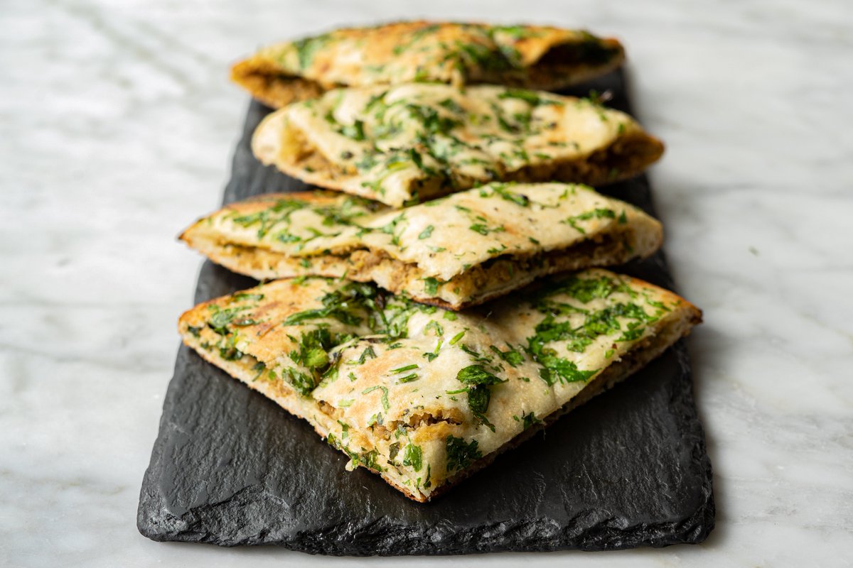 New to the menu at Karma Modern Indian is a stuffed Naan with Minced Chicken that is baked to perfection upon order. 

#naan #stuffednaan #indiancuisine #dc #dcdining