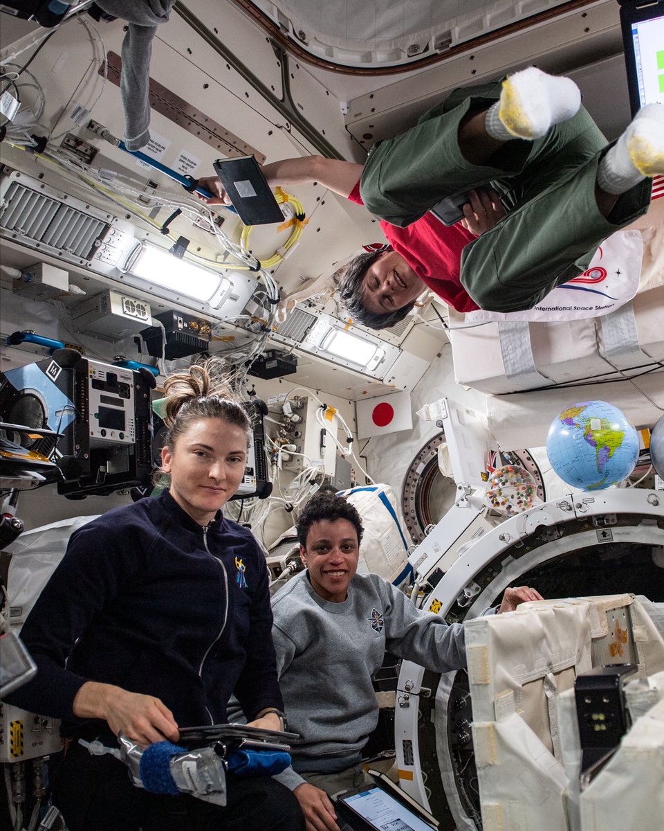 Expedition 67 Flight Engineers Kayla Barron and Jessica Watkins, both from NASA, and Samantha Cristoforetti from ESA (European Space Agency) are pictured checking out systems inside the International Space Station's Kibo laboratory module.