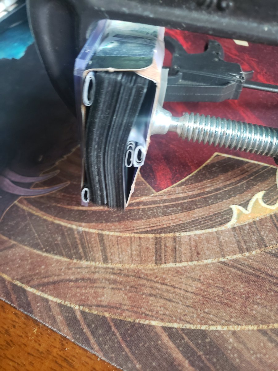 TheOtherGreek's tweet photo. Hey @wizards_magic , can you guys do something about the Pringle effect on foils? It's a little ridiculous trying to fix your print issues. Especially with the bundle lands. Thanks. https://t.co/WbA6FMCym2