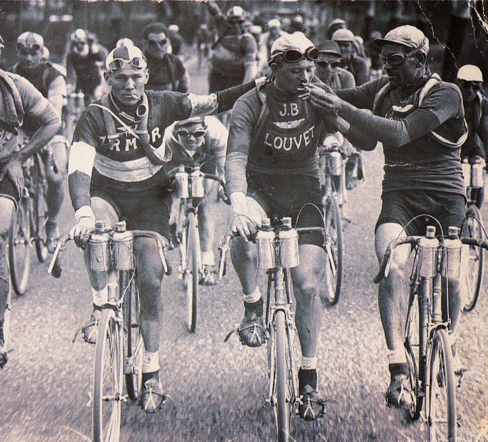 historydefined's tweet photo. Just two friends sharing a cigarette during the Tour de France, 1920s. https://t.co/T76s6H1lAz