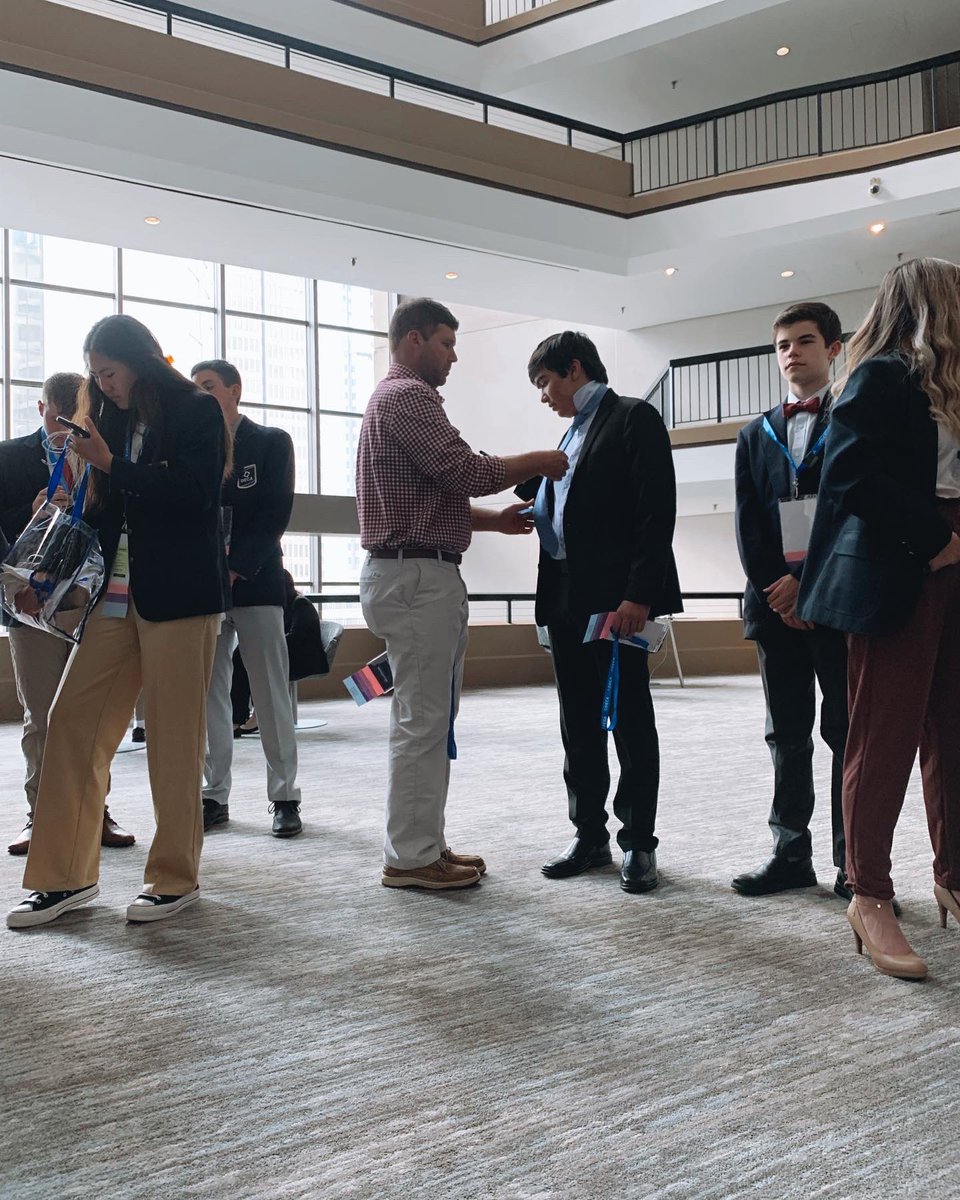 Blacksburg_deca's tweet photo. He ties our ties, he takes our pictures, he cheers us on, he is…our DECA Dad. Thank you Mr. Metz for all your support this past weekend in Atlanta!! You never fail to put a smile on our faces. 💙 #decadad @CatleysClasses @BburgHSBruins https://t.co/IKepVQU08t
