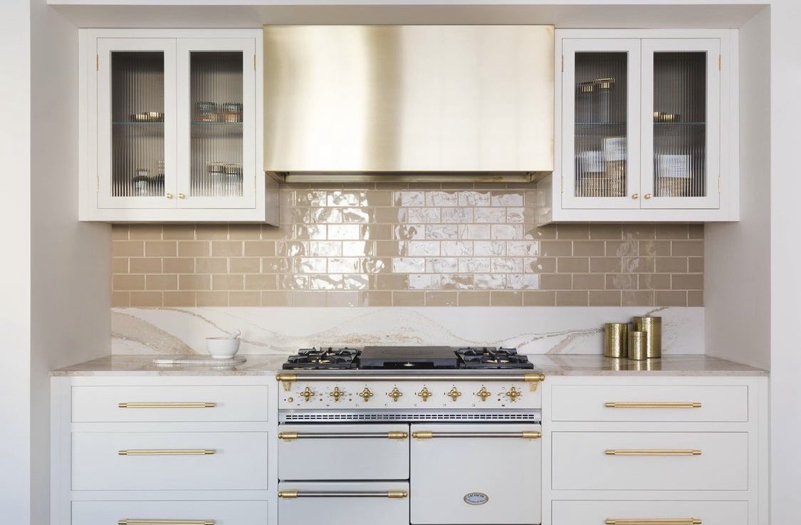 Pure white &amp; brass… is there a better combo? 
.
One of the stunning displays at the north London home of <a href="/WoodWorksOnline/">The Wood Works</a> including a real focal point in the form of this solid brass bespoke Westin hood