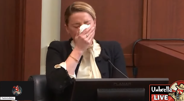 ThatUmbrella's tweet photo. Amber Heard is FAKE CRYING.

FAKE CRYING.

NO TEARS. It is QUITE THE SHOW. https://t.co/qONM4RYj2p