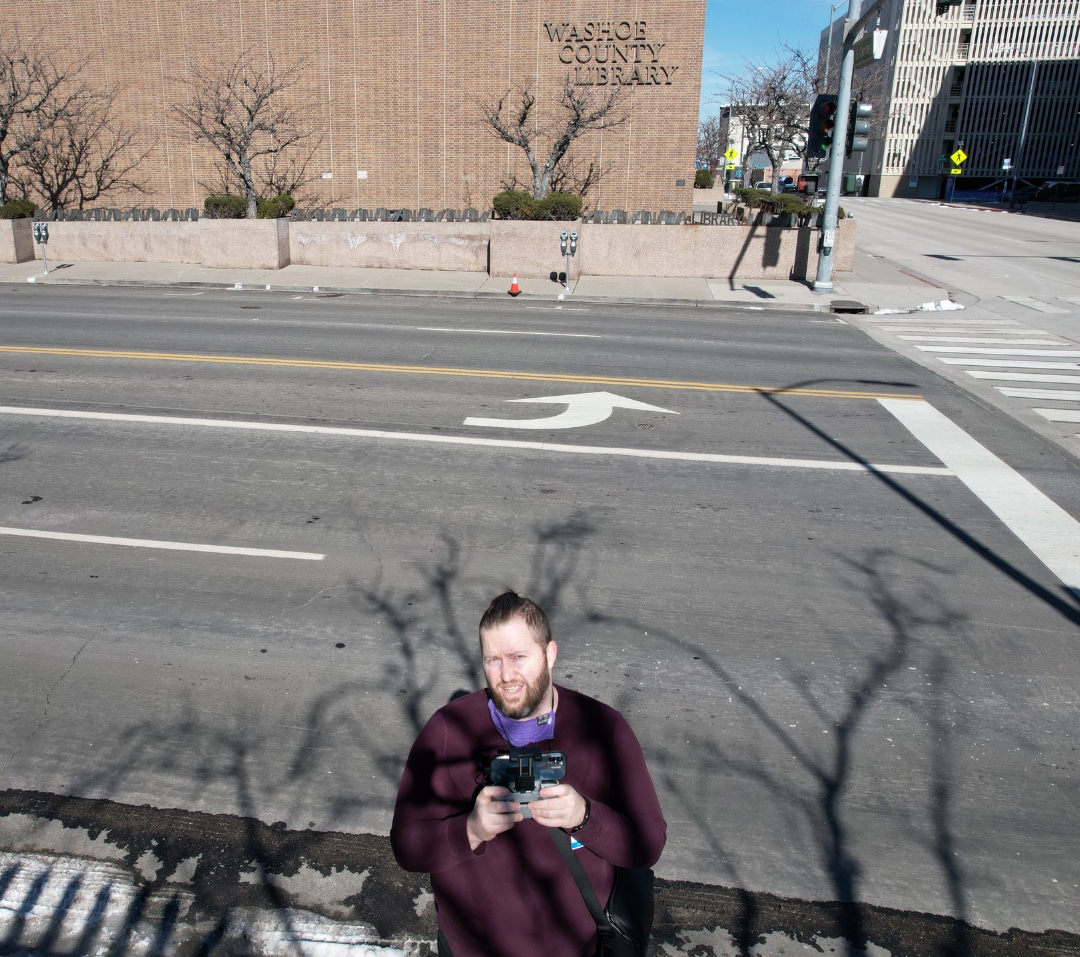 WashoeLibrary's tweet photo. Here's Kris, our drone pilot, filming some exterior shots for the #GettoKnowYourLibrary video series! Don't forget to check out these videos and learn about the different library branches! The #SeniorCenterLibrary episode airs Sunday, May 8 at 1 pm on Facebook. https://t.co/tss2ZAm7XR