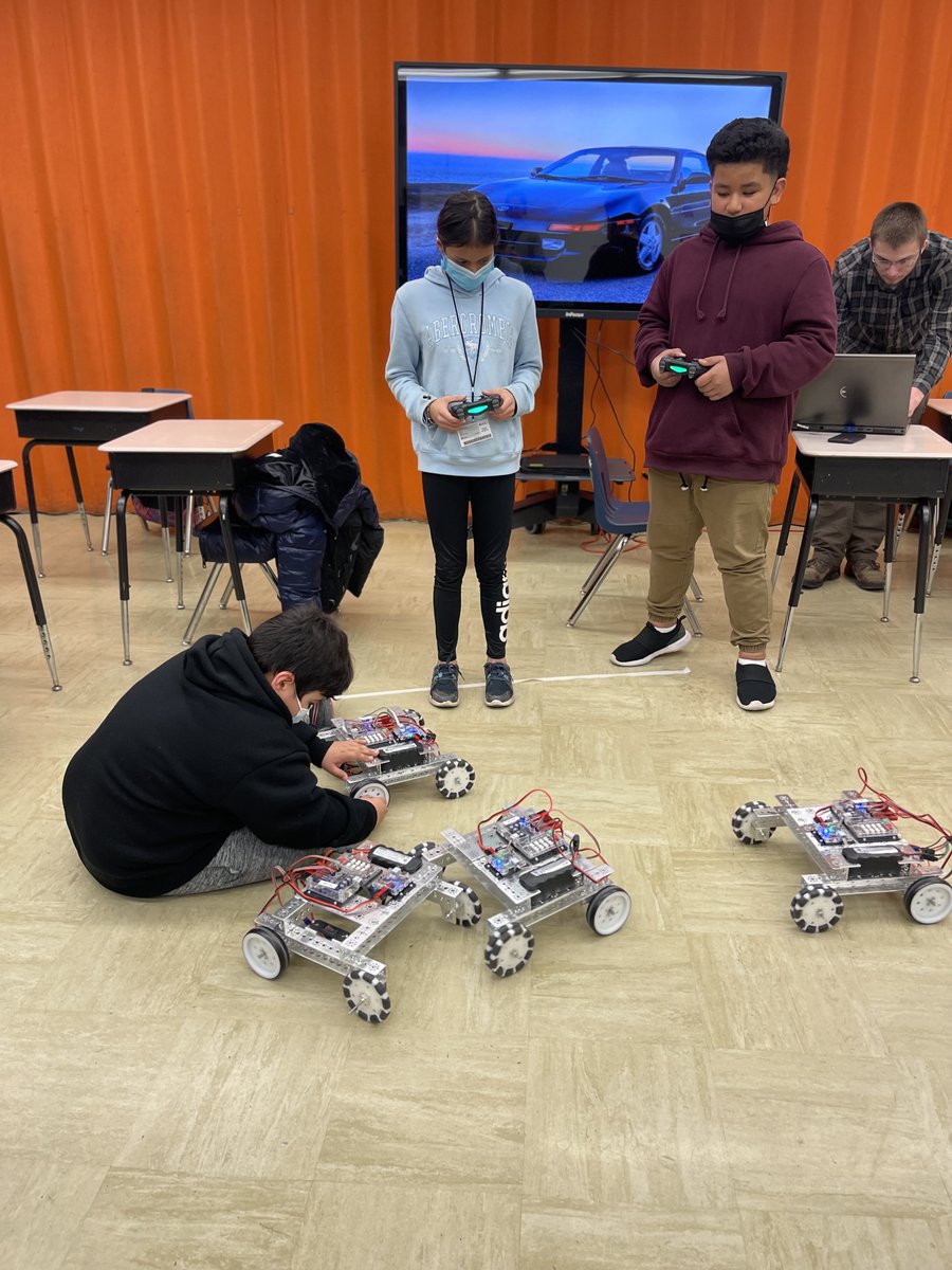 WeAreNCCP's tweet photo. A big thank you to the @CLCIllinois Baxter Innovation Lab for leading an on-site field trip for our ASEP students at AJK! Students had a great time learning about STEM by building circuits, racing robots, and seeing a 3D printer in action. #ProjectInnovate https://t.co/gnNrDiQj2C