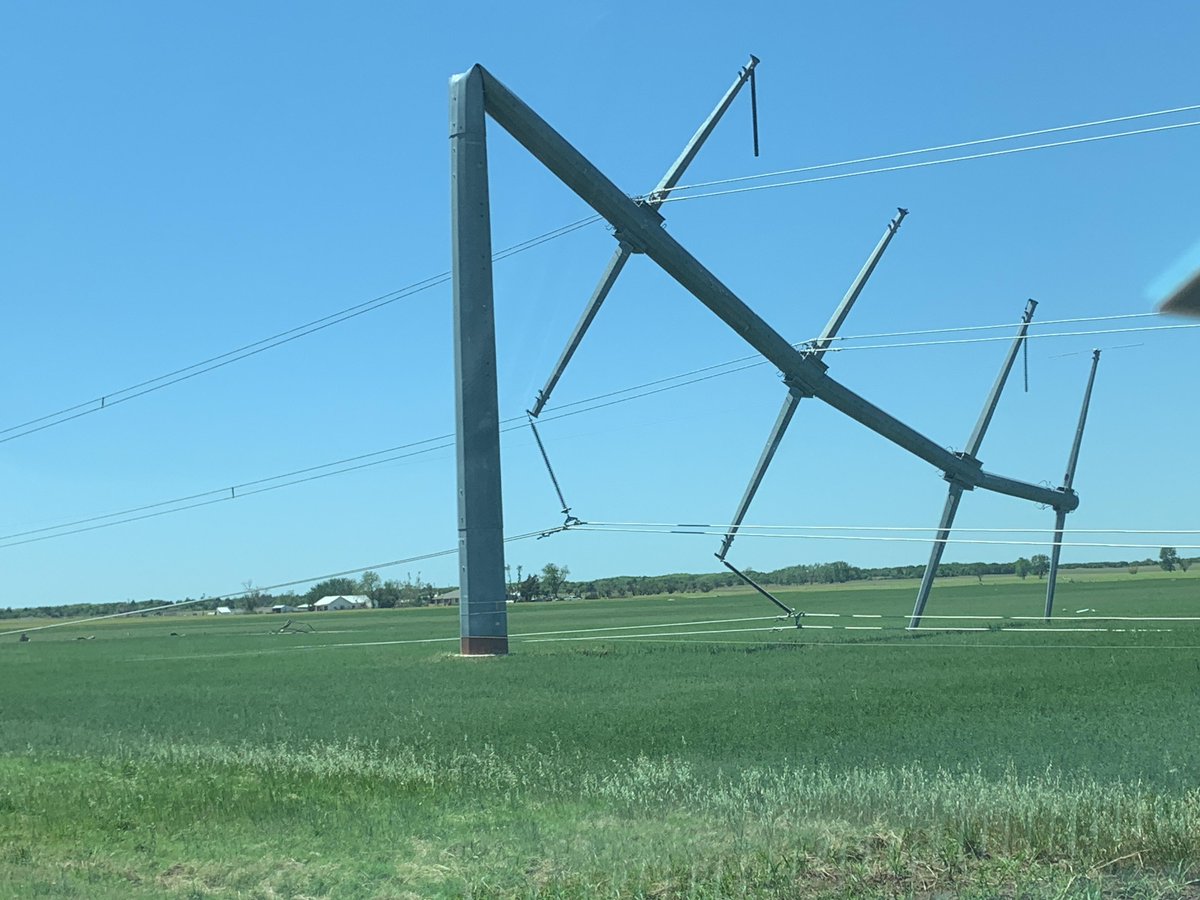 NWSNorman's tweet photo. Damage surveys continue, with EF3 damage found near Lockett, Texas from last night's storm. Metal power poles bent almost down to the ground. EF3 damage near Lockett, with 140 mph winds likely. #texomawx #tornado https://t.co/ljild50Eui