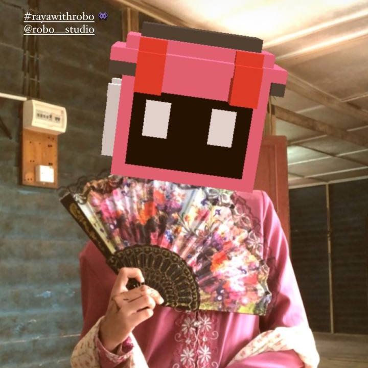Robo__Studio's tweet photo. GM and TGIF everybot! 🤖

Which Robo filters do you like the most? 
Looks like @erynnazhar chose the #0019 robot which compliments her OOTD. Looking cute Erynn! 😆
#RayaWithRobo https://t.co/3x82lFw3g8