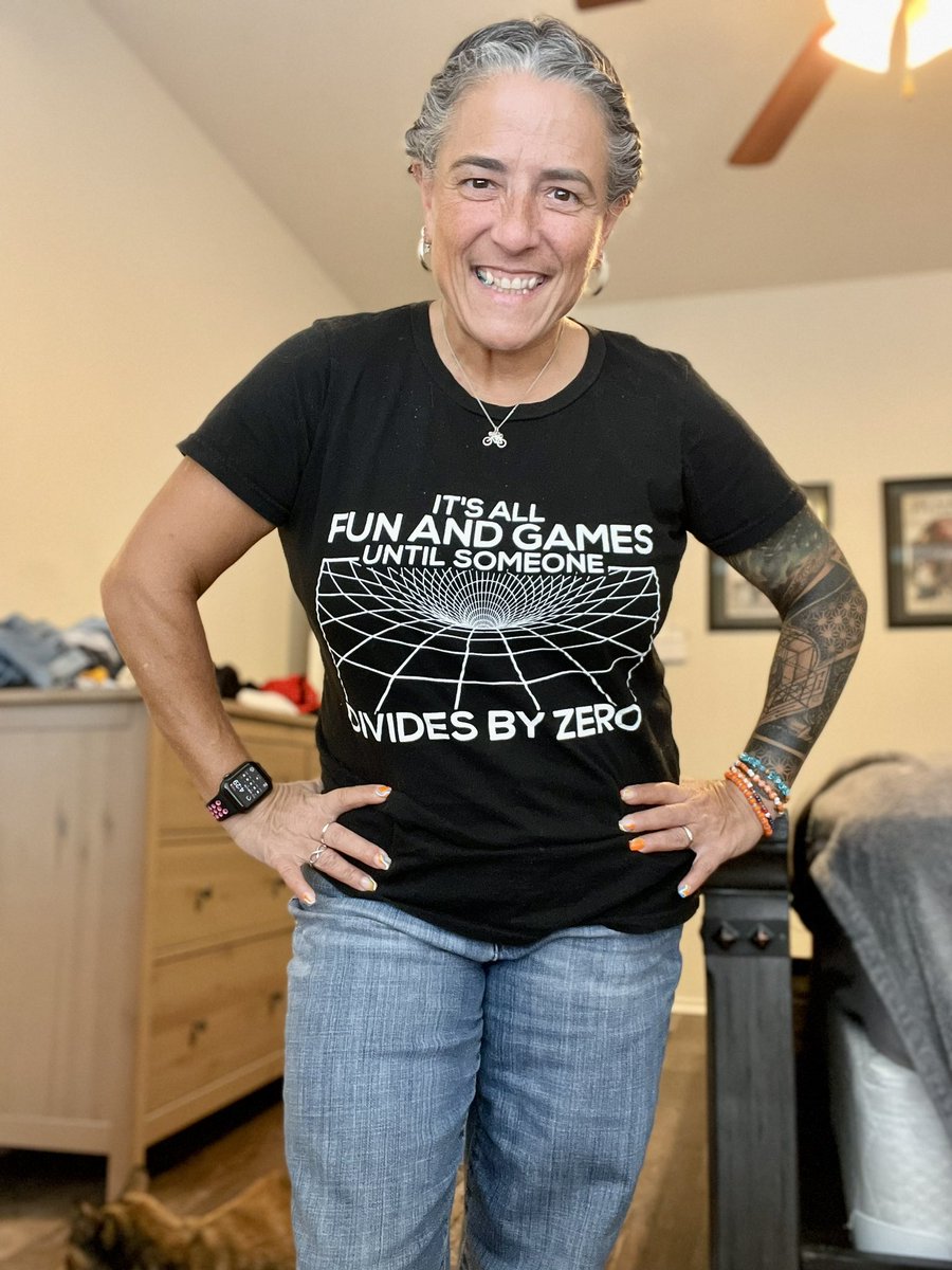 MrsEppsMath's tweet photo. I forgot to take a pic of todays math shirt.  This is one of my favorites cause kids always engage and ask questions “what happens when we divide by zero?” 😁. #math #iteachmath I need more #mathtshirts https://t.co/MIKkDFNy8X