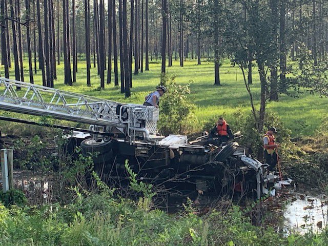 HFD_8's tweet photo. Earlier this afternoon Hardeeville Fire Department responded Mutual Aid to Jasper County Fire-Rescue on Deerfield Rd for a MVC with a vehicle in the canal. Truck-84 assisted with getting the patients safely removed from the incident. @jasperscfire https://t.co/89ZgI8VXUE