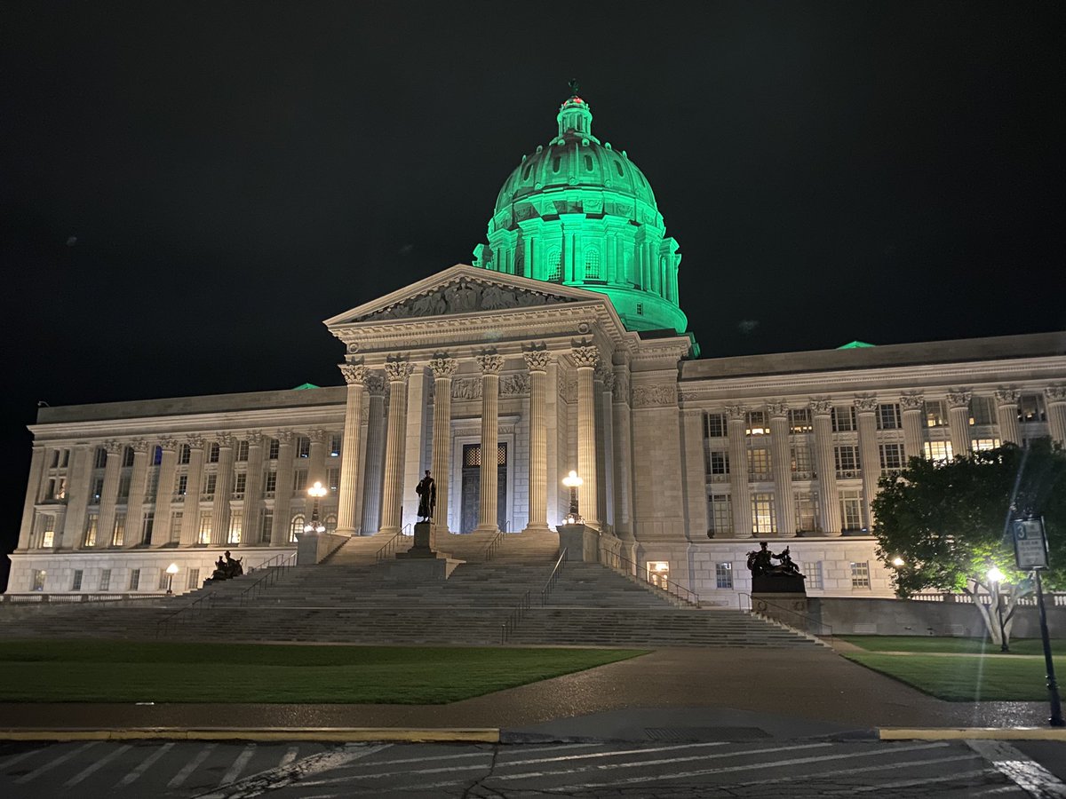 EmilyManleyTV's tweet photo. The beautiful MO Capitol is shining green tonight in honor of Children’s Mental Health Week. Last week @GovParsonMO declared May as #MentalHealthAwarenessMonth. Roughly 1 in 6 children are diagnosed with a mental illness. For info on resources: https://t.co/tWG97K6Rfc #moleg https://t.co/qPQHuPKJIq