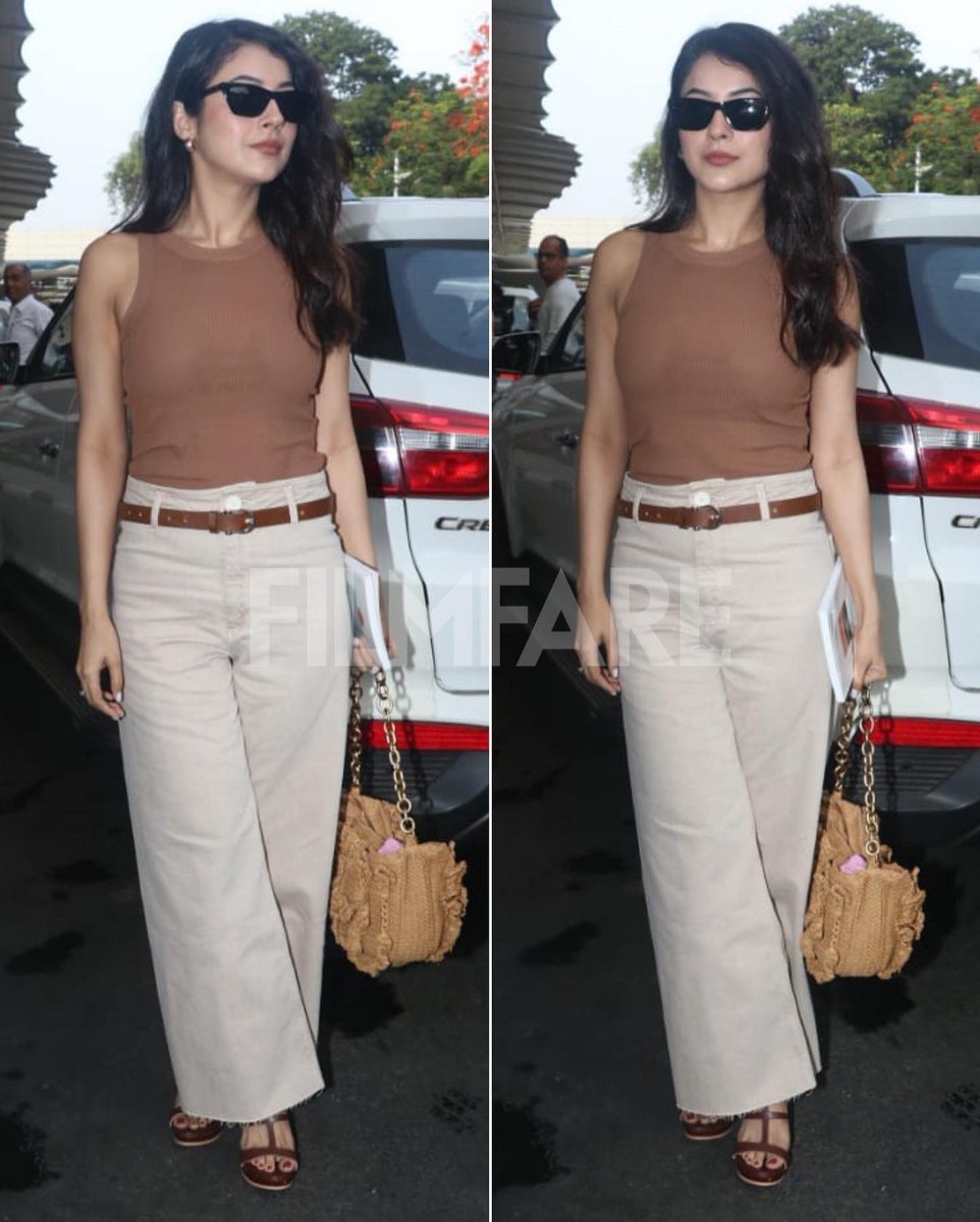 Chic and sweet! #ShehnaazGill was papped at the airport today. 🤎🤍