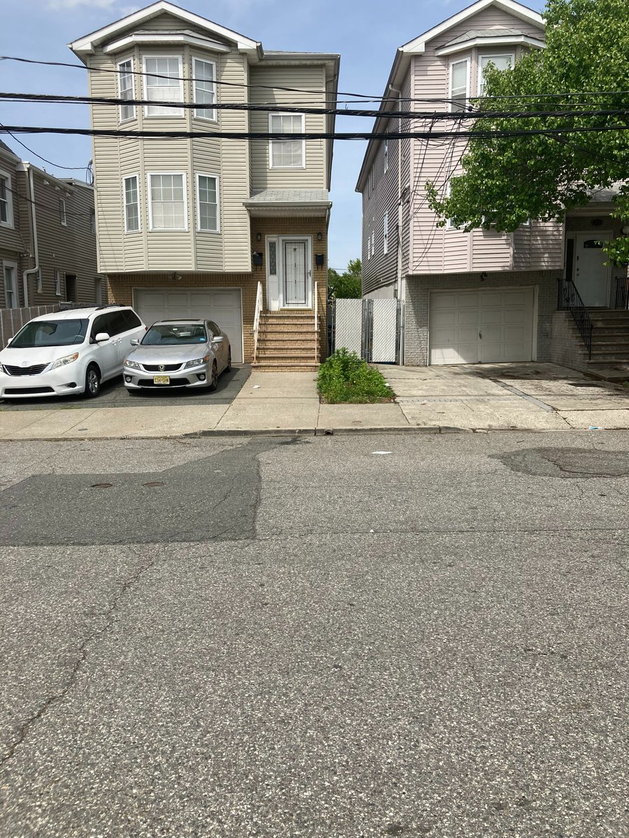 Due to new pickup plan during dismissal at the University Heights Charter School's Lower School, the driveways of the neighbors on Hartford Street in Newark are clear. The plan instructs parents to park in the Bethany Church lot during dismissal, which kept the street safe.