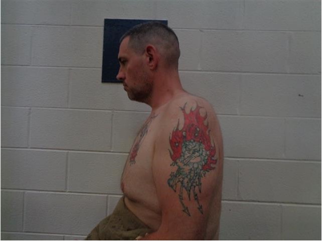 Tattooed white male left.