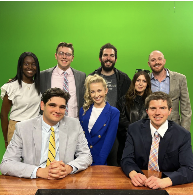 UKJAMschool's tweet photo. These are some of our School of Journalism and Media Broadcast Multimedia students who will receive their degrees at Rupp Arena Commencement this morning, pictured on set w their beloved professor, Andrew Dawson. https://t.co/LoVfgZ7tMf