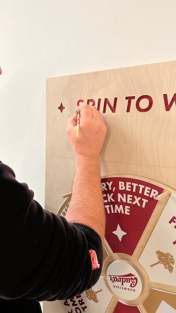 🖌️ Something a little different this week, Zak has been hand painting signage on a bespoke made prize wheel for <a href="/BudvarUK/">The Original Budweiser Budvar UK</a>  as part of their new bar setup for 2022 - good job he has a steady hand! 🥲

#handpainting #signwriting #signs #exhibition #customsigns #birchplywood