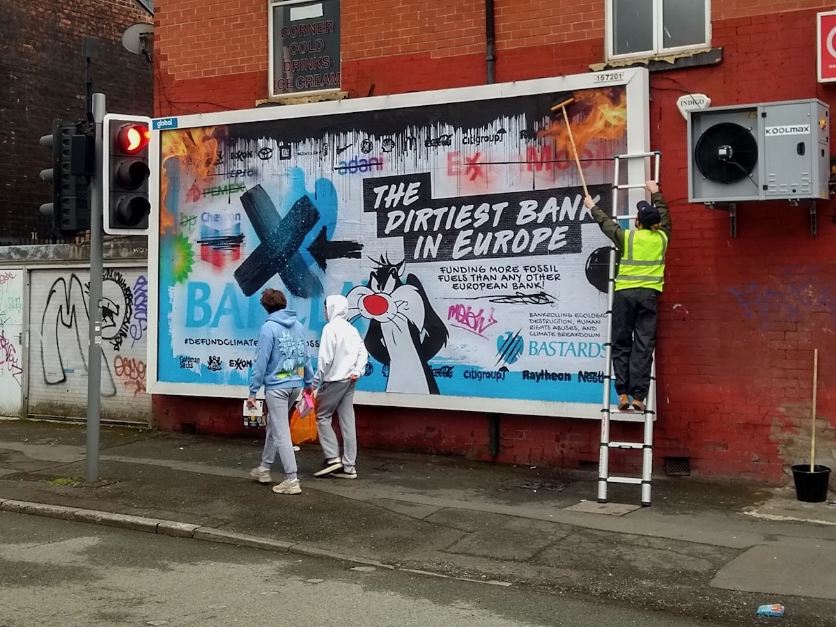 .<a href="/Barclays/">Barclays Bank</a>... or should that be Bastards 👀 Spoof billboard in Manchester installed to dish the dirt on (still) the dirtiest bank in Europe.

Art design by @STMKTS for #BarclaysAGM. #FossilBanks