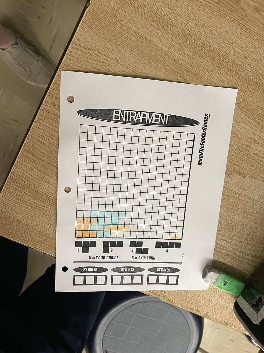 VicMartin33's tweet photo. Today’s math game is a variation of Tetris. Students need to use translations, reflections, and rotations to fill in the grid. The last person to add a shape wins. #mathgamefriday @HolyFamilyWdstk https://t.co/jErMnnsGvC
