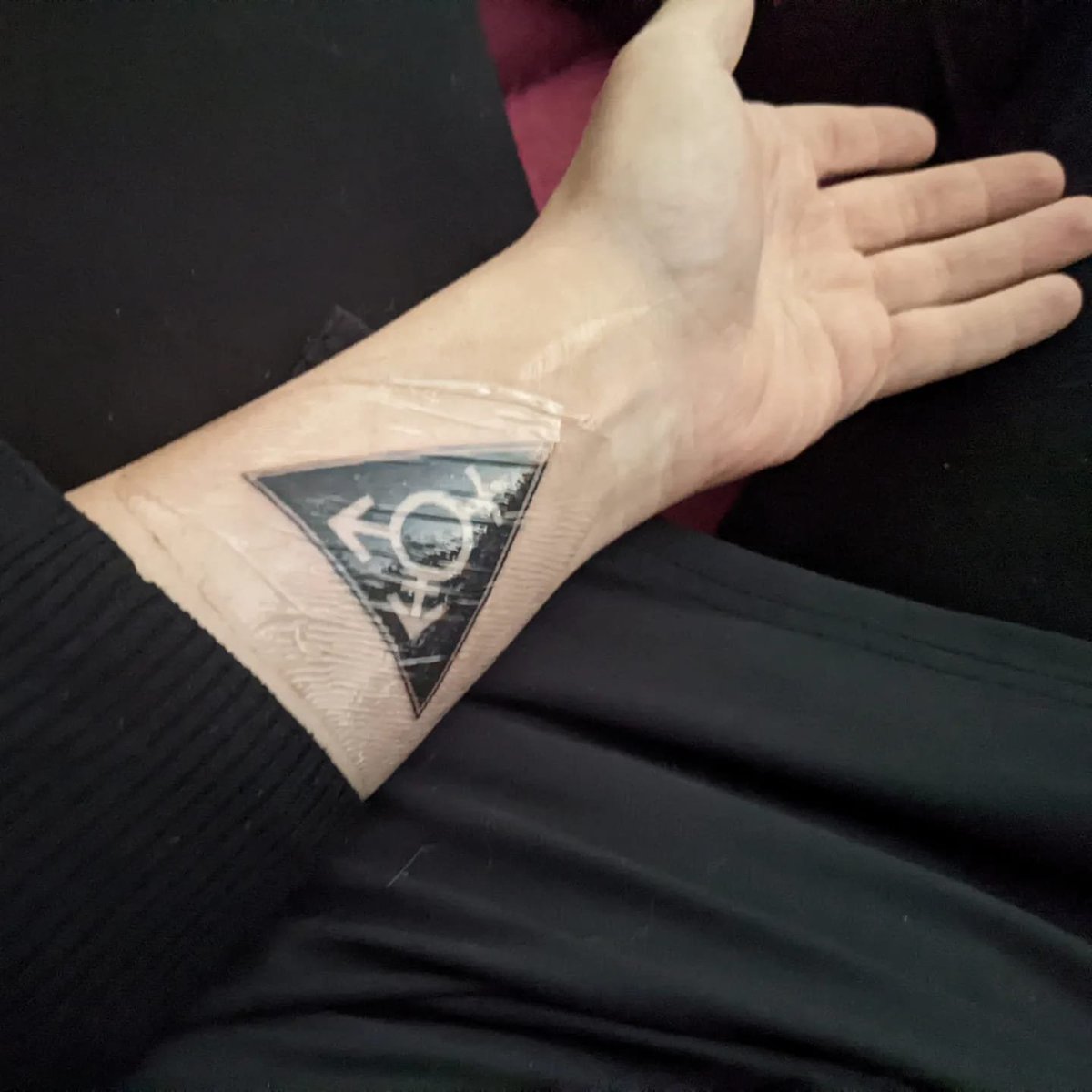 coratheimplorer's tweet photo. prepping for mother's day with a @tearituporg-inspired tattoo on my forearm, right where my extremely estranged mother said the gays that run the united nations were going to implant microchips of the mark of the beast during the great tribulation when i was a kid https://t.co/ita1vaEwej