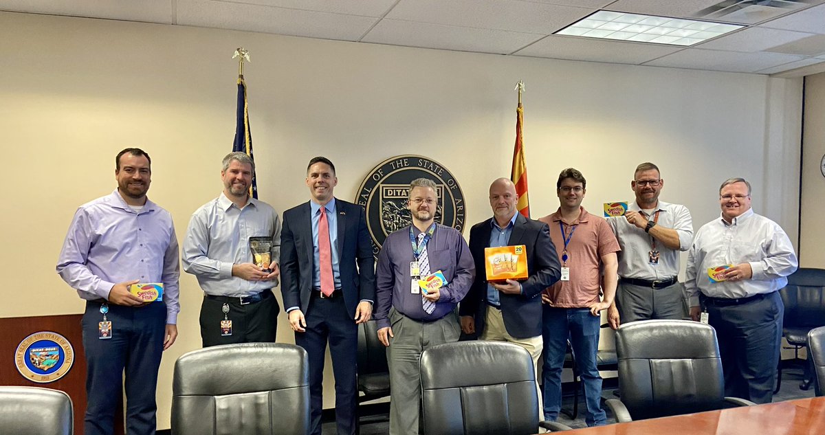 TimRoemerAZ's tweet photo. How do you defend the state from rising cyber attacks, with a great human firewall. Yesterday I visited @ArizonaDES to thank them for being a model agency when it comes to #cybersecurity. I brought chocolate covered gold coins for saving us bitcoin, plus goldfish/Swedish fish. 🐠 https://t.co/vucblAlHsg