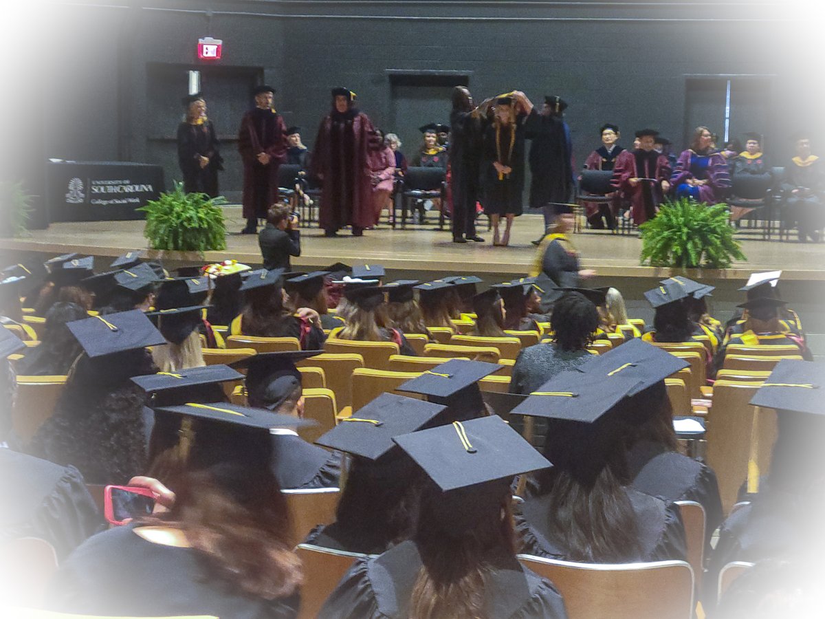 uofsccosw's tweet photo. It was the perfect day for the @uofsccosw hooding celebration! And as they move on to tomorrow's #UofSC2022 Commencement, we will treasure our newest alumni! #cockyaboutsocialwork #ForevertoThee #TheRemarkableWe https://t.co/Yt93mzPWTe