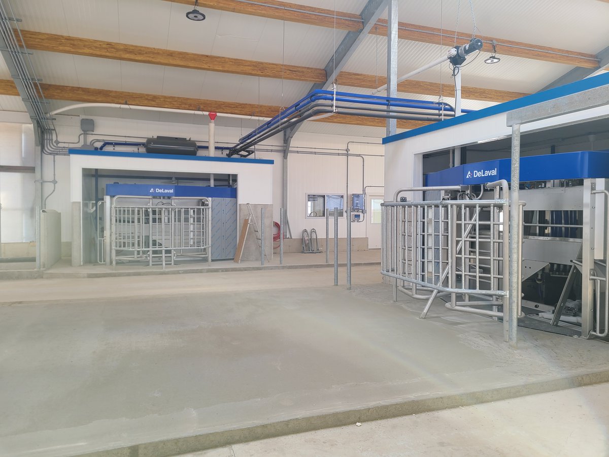 DortmansB's tweet photo. Progress Report -barns are being cleaned after concrete. Cows are getting used to their new collars with activity monitors. Delpro system and cow data being prepared. This pair of VMS 310s will soon be ready to get rocking! #DeLaval #vms310 https://t.co/VCJaORsS5Q