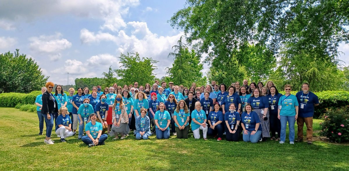 SequoyahRegLib's tweet photo. #NewHeaderPic Summer Learning and Fine-Free Summer begin on June 1! Our staff thought you'd like to know, so we all got together and wore our #OceansOfPossibilities shirts. #SeqLib #GeorgiaLibraries https://t.co/2ZgsIbTUsv