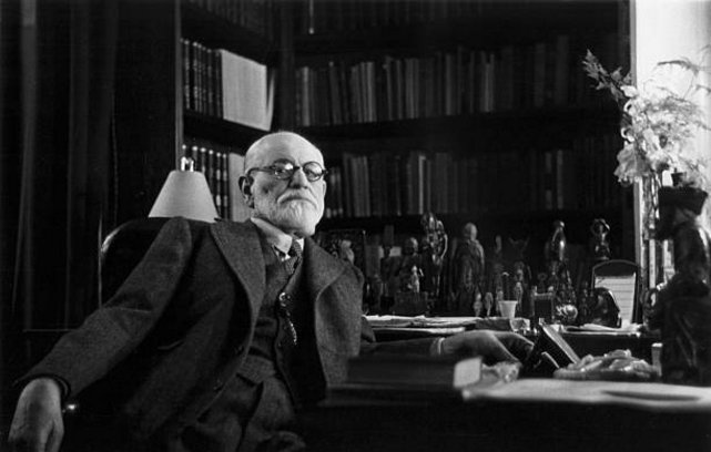 Sigmund Freud, again in his Vienna office in 1937, again in a photo taken by a surprising person. This time it's Princess Eugenie of Greece.