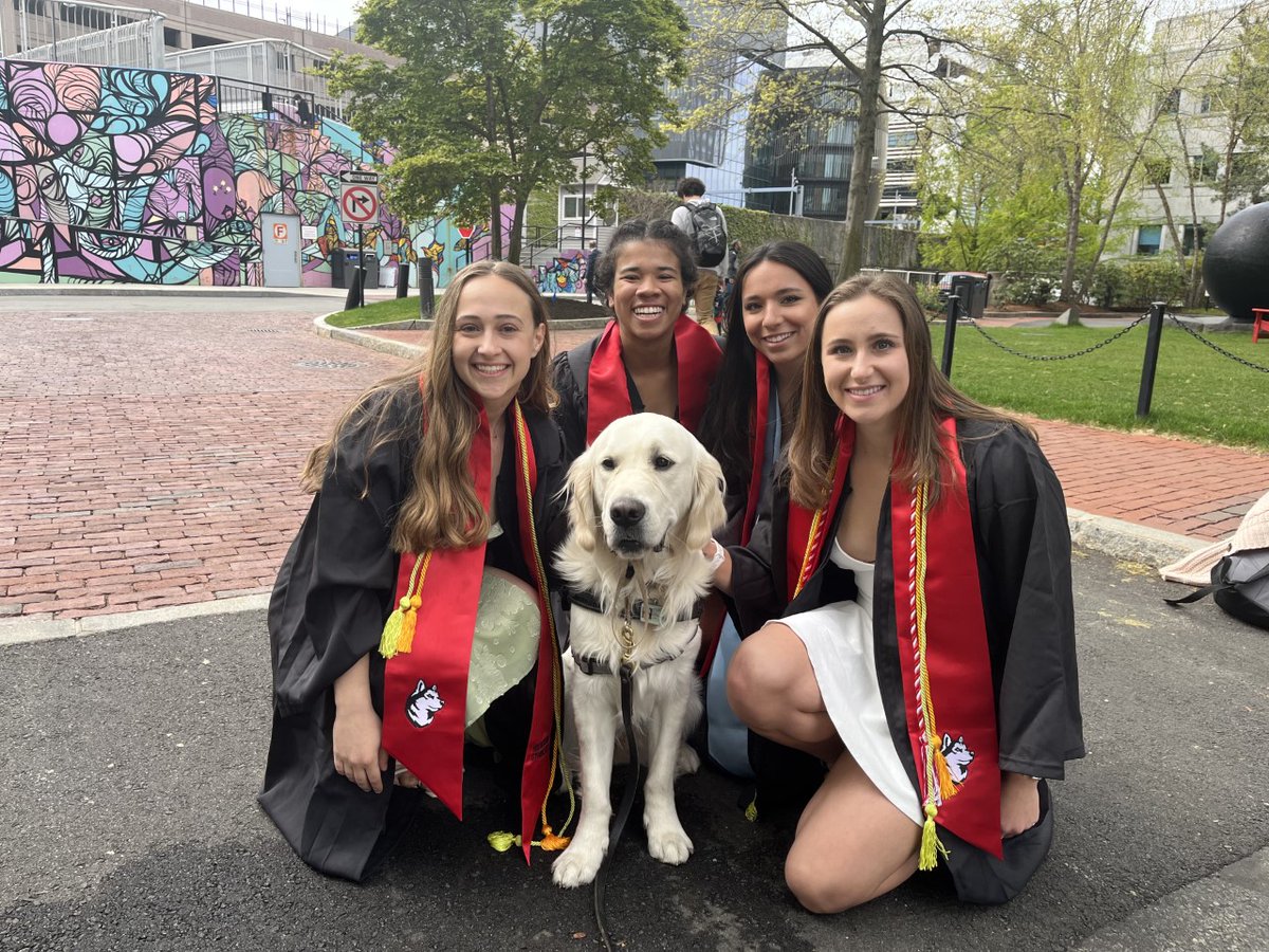 northeasternpd's tweet photo. Your man Cooper has been running into a lot graduating #huskies this week. This group, in their newly issued gowns and stoles, asked Ofc. Jolliffe if they could take a pic with him. Of course and #congrats #northeasternuniversity #northeastern #nupd #commencement2022 #itsnucooper https://t.co/yEI28vym5X