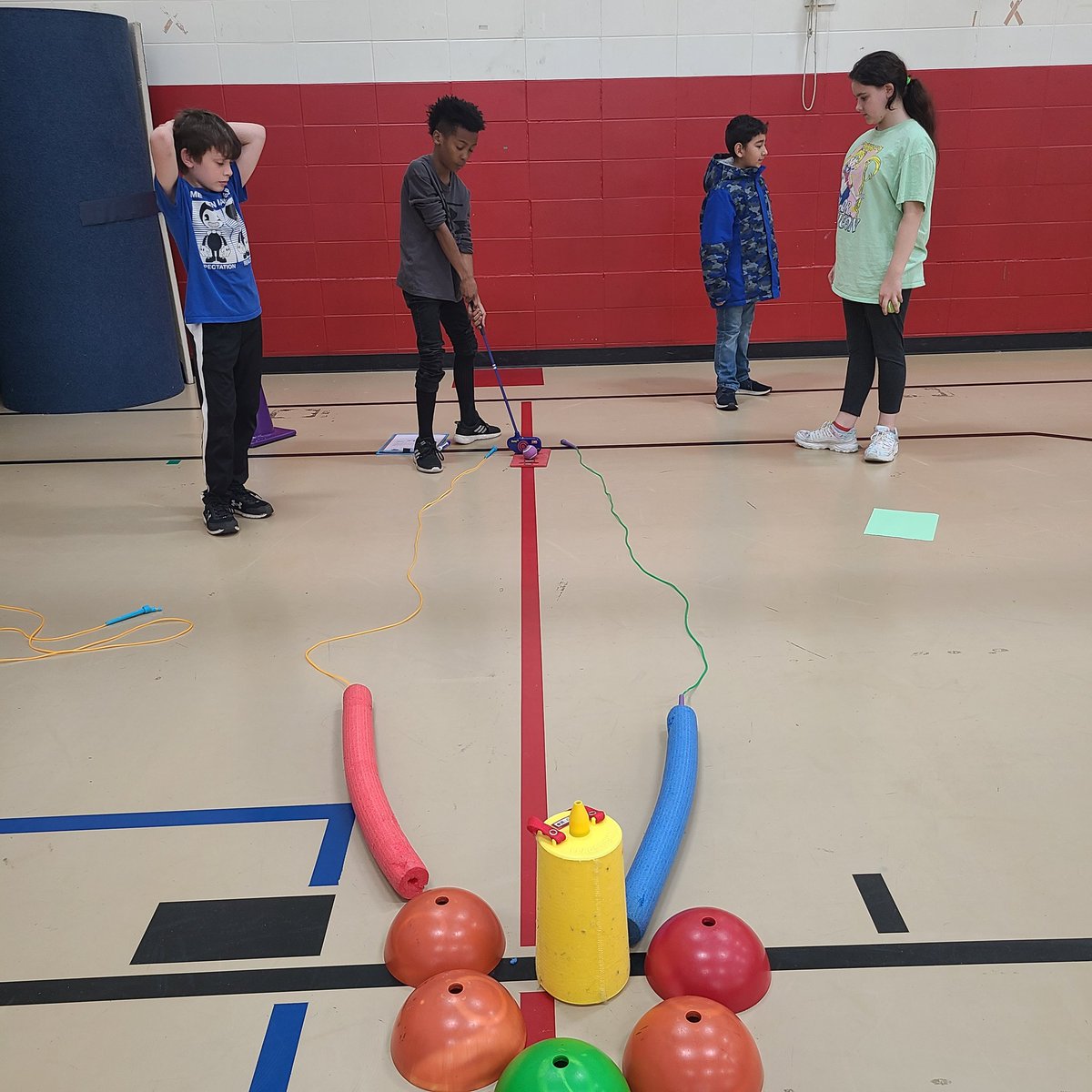4D working on some putting ⛳️ in PE. They did an awesome job designing their mini golf course.