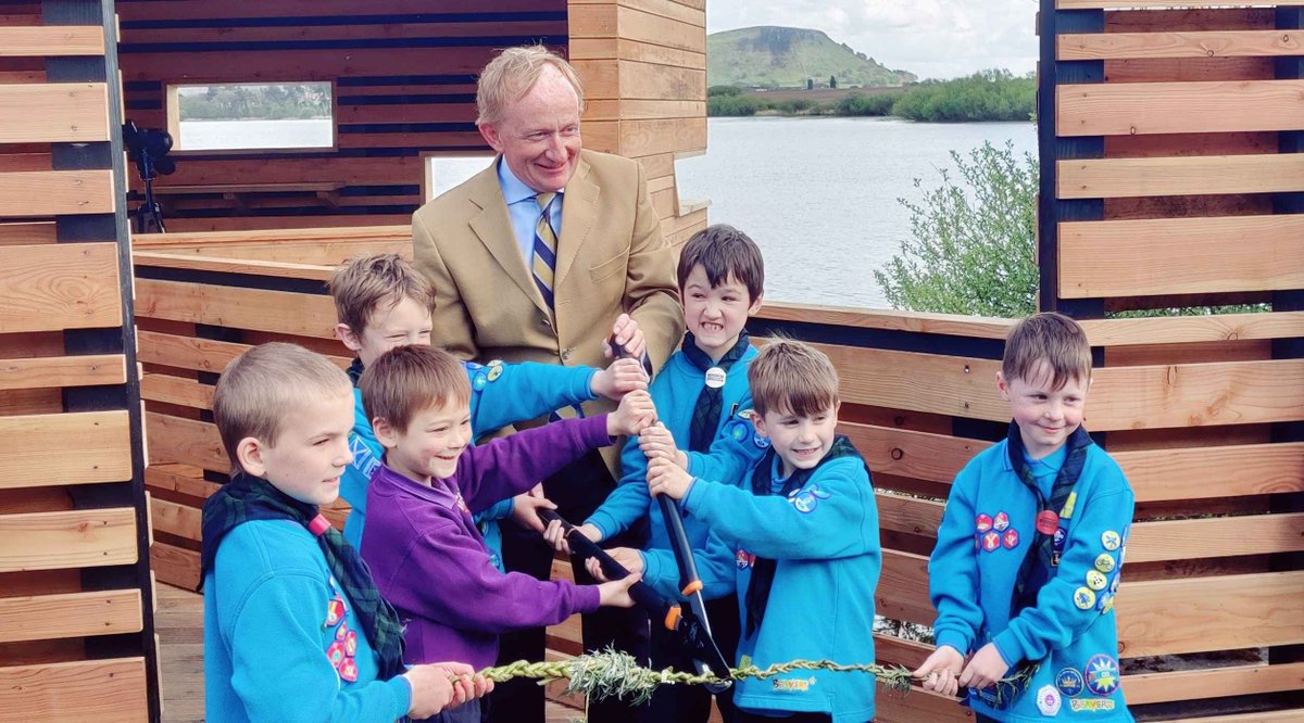 NatureScot's tweet photo. Thanks to our Chair Mike Cantlay and the Kinross Beavers for the enthusiastic 'ribbon' cutting to officially open our new Phoenix Hide at Loch Leven today! Huge thanks to everyone who helped make this possible: https://t.co/Wfx948yYzt https://t.co/pQFb7dS9Mm